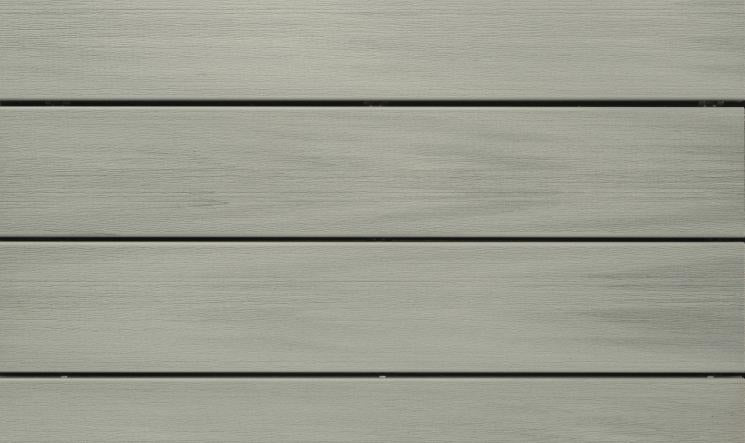 Détail de lames de terrasse en bois composite avec finition lisse et espacement régulier pour aménagement extérieur