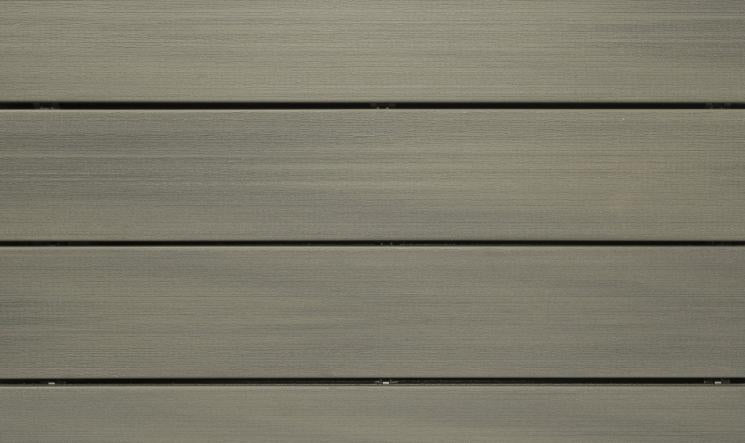 Détail de lames de terrasse en bois composite avec finition lisse et espacement régulier pour aménagement extérieur
